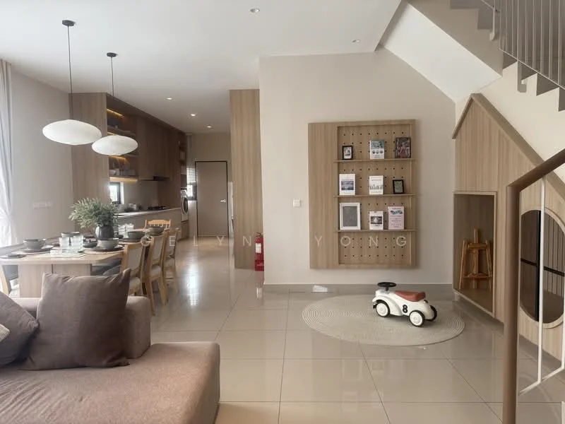 Living features: grey fabric sofa, wooden coffee table, area rug with circular shape, wall-mounted bookshelf with decorative items, pendant lighting above dining area, large windows with sheer curtains, tile flooring, open layout to dining area, decorative wall with framed photos, small toy car on the floor; style: modern. Dining features: 6-seater dining table, light wood dining chairs, pendant lights above dining table, open kitchen layout, kitchen cabinetry visible in background; style: modern.