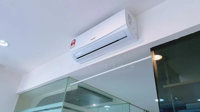 Room features: wall-mounted split AC, recessed downlights, white painted walls, glass partition.