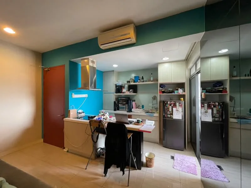 Kitchen features: blue accent wall, white cabinets, stainless-steel fridge, black fridge, built-in oven, microwave, kitchen island with seating, countertop, recessed downlights, wall-mounted split AC, tile flooring, open shelving, decorative items on shelves, kettle, toaster; style: modern.