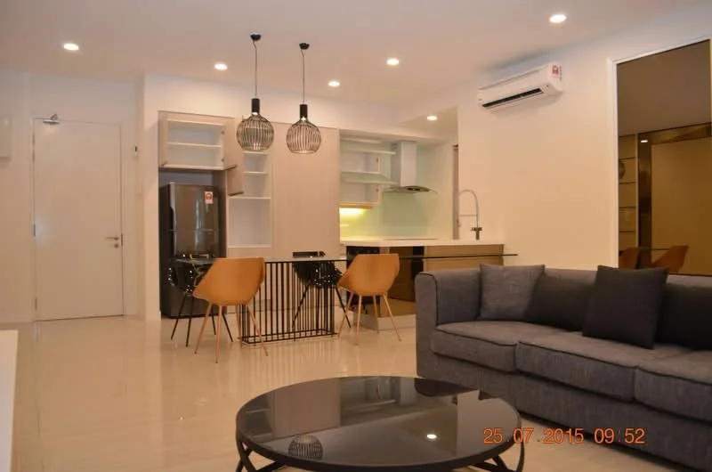 Living features: 3-seater fabric sofa in grey, round coffee table, wall-mounted air conditioning unit, recessed LED downlights, pendant lighting, open-plan layout, tile flooring, neutral wall colour, decorative wall art; style: modern. Kitchen features: kitchen cabinetry in light wood, stainless-steel fridge, built-in oven, ceramic cooktop, single-bowl stainless-steel sink, chrome pull-down faucet, white backsplash, breakfast bar with seating, open shelving; style: modern.