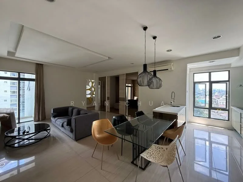 Living features: grey fabric sofa, glass coffee table, dining table with transparent chairs, pendant lighting, floor-to-ceiling windows, cream painted walls, marble tile flooring, air conditioning unit, open layout, city view; style: modern; view: city. Kitchen features: kitchen island, stainless-steel sink, built-in cabinetry, countertop, recessed downlights; style: modern.