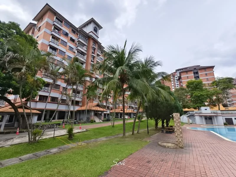 Exterior type: low-rise apartment block; features: red brick facade, multiple storeys, balconies with railings, landscaped garden, palm trees, manicured lawn, swimming pool area, outdoor seating area, walkway with paving stones; style: modern.