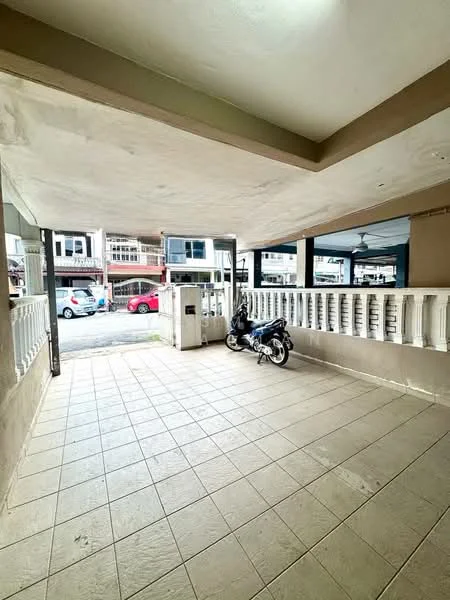 Exterior type: linked terrace house; features: tiled flooring, covered porch area, white railing, motorcycle parked, open space, street view, surrounding residential buildings; style: modern.