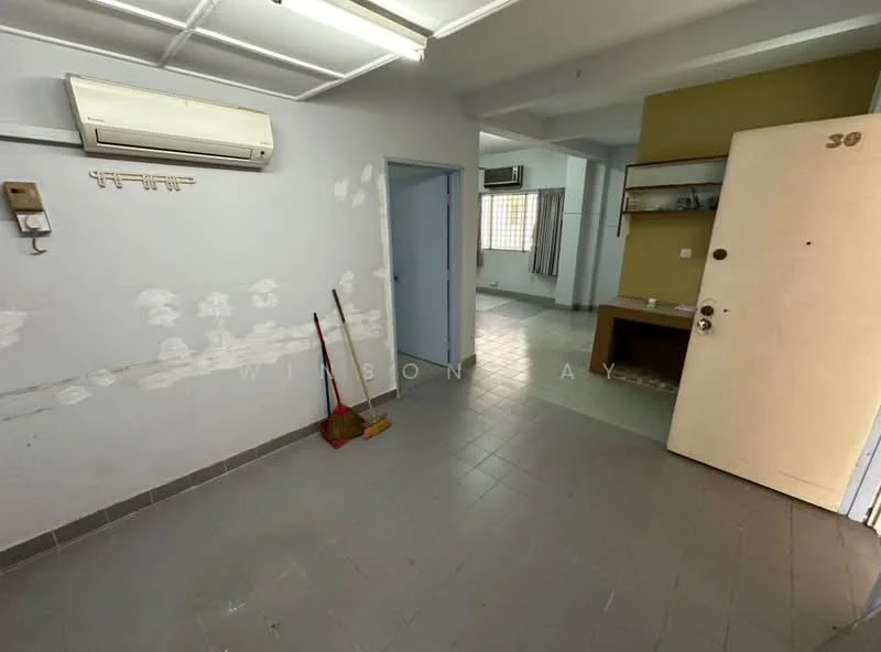 Room features: grey tiled flooring, white painted walls, 1 wall-mounted split AC, door with number 30, wooden console table, window with curtains, cleaning broom, light fixture on ceiling.