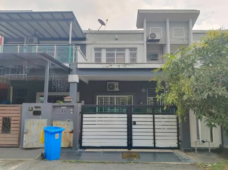 Exterior type: linked terrace house; features: two-storey building, grey painted facade, white horizontal slatted gate, front porch with tiled flooring, balcony on the upper floor, multiple air conditioning units visible, satellite dish on the roof, manicured shrubbery in front, driveway with interlocking pavers; style: modern.