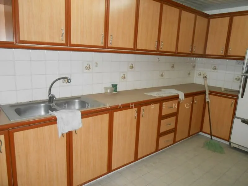 Kitchen features: single-bowl stainless-steel sink, chrome faucet, laminate countertop, wood cabinetry with brown finish, white tiled backsplash, ceramic tile flooring, built-in refrigerator, kitchen towel on countertop, cleaning mop, green cleaning cloth.