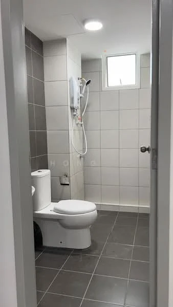Bathroom features: white toilet, shower with wall-mounted showerhead, grey tiled walls, white tiled walls, grey floor tiles, window for natural light, mirror above sink, light fixture in ceiling; style: modern.