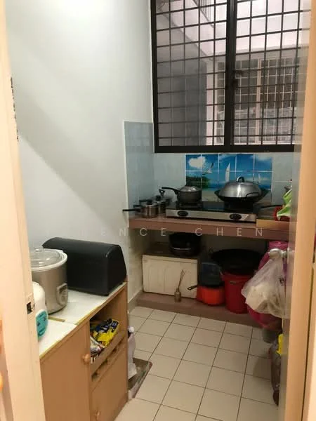 Kitchen features: white painted walls, tile flooring, single-bowl stainless-steel sink, chrome pull-down faucet, built-in countertop with storage underneath, rice cooker, stainless-steel pot, plastic storage containers, window with metal grille, kitchen cabinets, various colored plastic bags, cooking utensils.