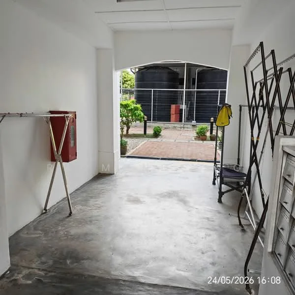Laundry features: grey polished concrete flooring, white painted walls, exposed ceiling, laundry rack, mailbox unit, outdoor view through opening, potted plants visible outside; view: garden.