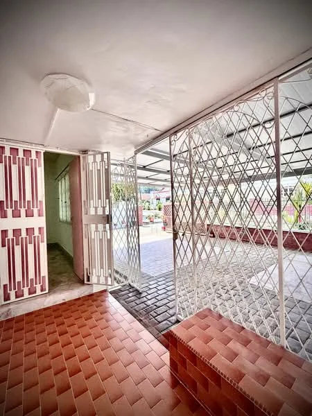 Room features: red brick flooring, white painted walls, metal security grille, glass roof, open layout, double doors, exposed ceiling, natural light; style: modern; view: garden.