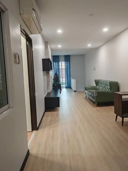 Living features: laminate flooring, white painted walls, recessed downlights, floor-to-ceiling windows, green fabric sofa, TV console, decorative plant, curtains, dining table, air conditioning unit; style: modern; view: city. Room features: laminate flooring, white painted walls, doorway, light fixture.