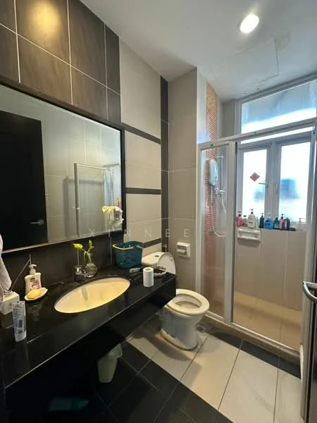 Bathroom features: black granite countertop, white ceramic sink, chrome basin mixer faucet, large wall-mounted mirror, white toilet, walk-in shower with glass enclosure, shower head, tile flooring, grey wall tiles, cream wall tiles, window with sheer curtains, storage shelves, various toiletries on shelves; style: modern.