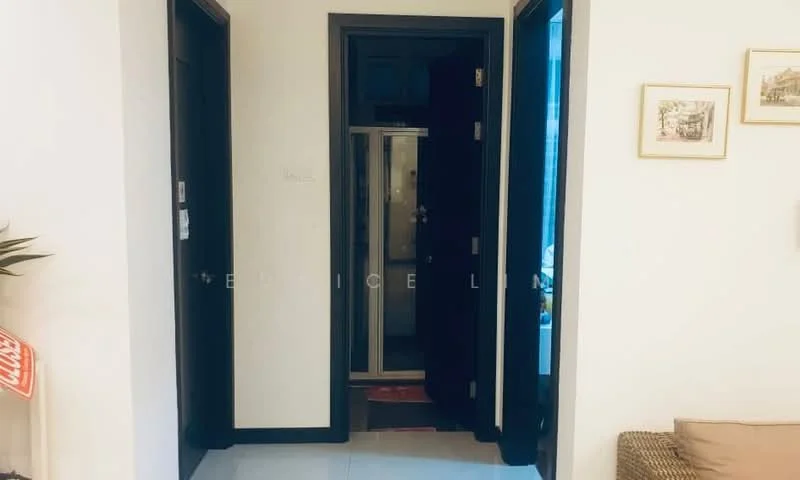 Room features: white painted walls, light grey floor tiles, dark wooden doors, door frames with black finish, framed artwork on walls, plant in ceramic pot, visible hallway, multiple doorways; style: modern.