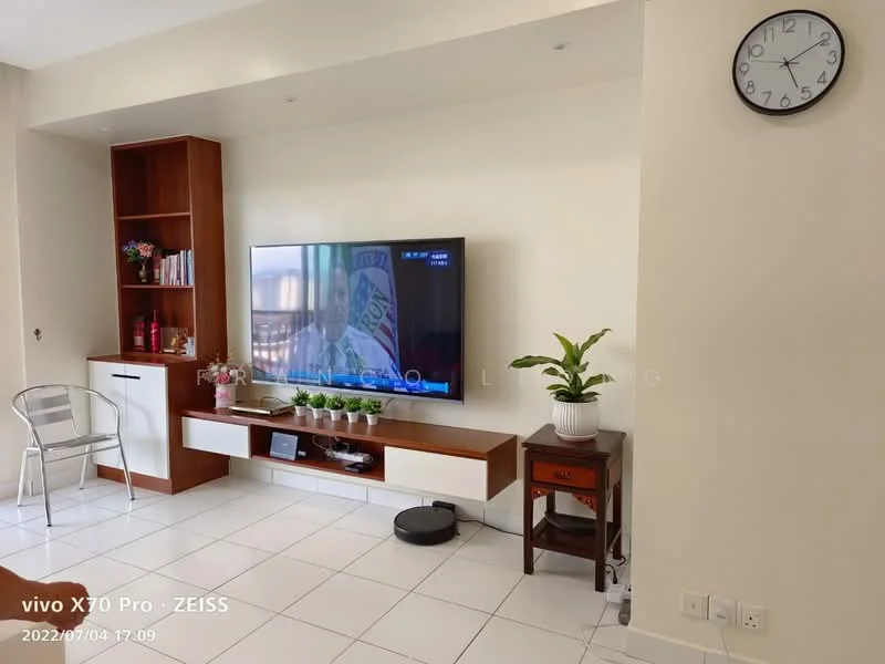 Living features: white painted walls, ceramic tile flooring, wall-mounted TV, wooden TV console, shelf with books, decorative plant, clock on wall, small wooden side table, metal chair; style: modern.
