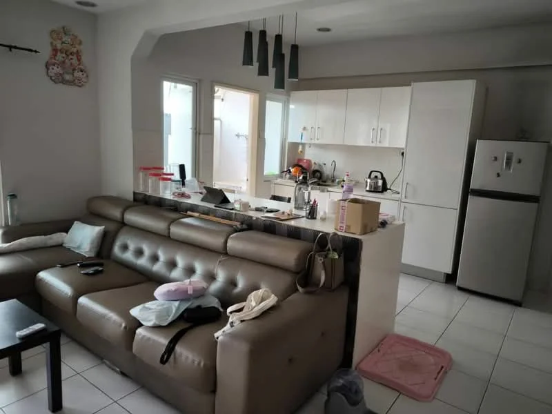 Living features: brown leather sectional sofa, black coffee table, white tiled flooring, recessed ceiling lights, pendant lighting, wall-mounted TV, decorative wall art, open kitchen layout, kitchen island with seating, white cabinetry, stainless-steel fridge, kettle, microwave, sink, countertop appliances; style: modern.