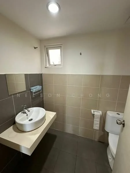 Bathroom features: single-bowl sink, chrome basin mixer faucet, floating vanity with countertop, white toilet, tile flooring, light grey wall tiles, dark grey accent wall, small window for natural light, towel holder, recessed ceiling light; style: modern.
