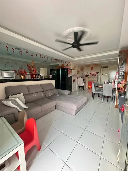 Living features: L-shape sectional sofa in grey, white walls, ceiling fan with light, tile flooring, recessed ceiling with crown moulding, decorative wall art, dining table with upholstered chairs, kitchen area with cabinetry, microwave, black refrigerator, decorative plants, open layout; style: modern.