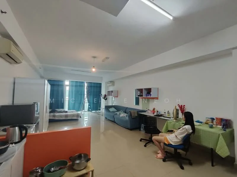 Room features: white painted walls, tile flooring, window with blue curtains, sofa in light blue, dining table with green tablecloth, kitchenette with sink, stainless-steel kettle, various kitchen utensils, air conditioning unit, recessed ceiling lights; style: modern.