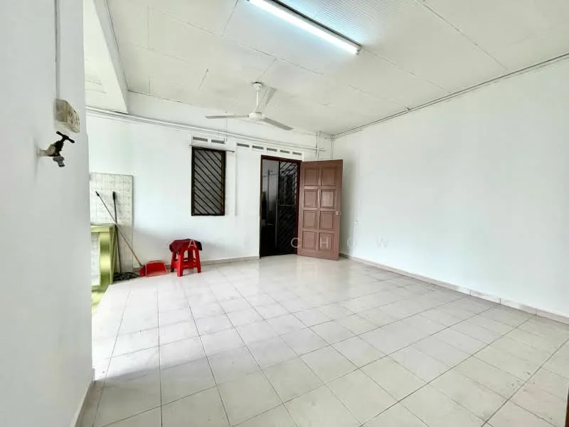 Room features: white painted walls, tile flooring, ceiling with fluorescent lighting, floor-to-ceiling windows, sliding glass door, single ceiling fan, wooden door, red plastic chair, green countertop, empty space; style: minimalist.