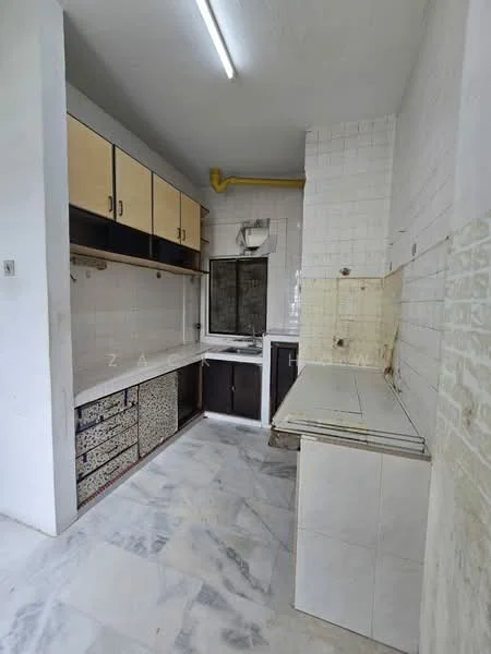 Kitchen features: white tiled walls, cream upper cabinets, dark lower cabinets, marble countertop, single-bowl stainless-steel sink, chrome faucet, built-in stove, exposed plumbing, tile flooring, window for natural light, overhead fluorescent lighting.