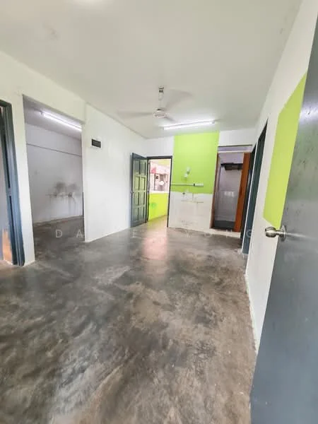 Room features: white painted walls, green accent wall, polished concrete flooring, ceiling fan, doorway leading to another room, doorway leading to kitchen area, light fixture on ceiling; style: minimalist.