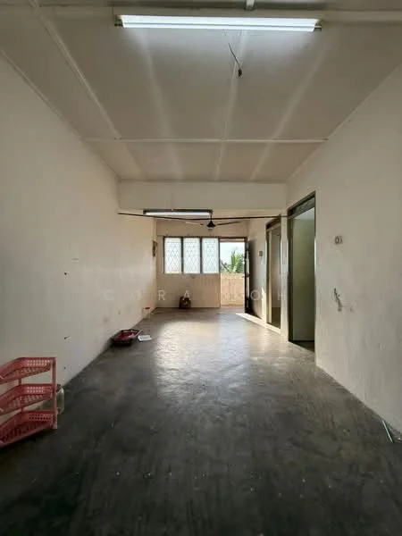 Room features: white painted walls, concrete flooring, exposed ceiling with beams, single ceiling light fixture, window with grid pattern, doorway leading to another room, open space layout, natural light from window; style: minimalist; view: garden.