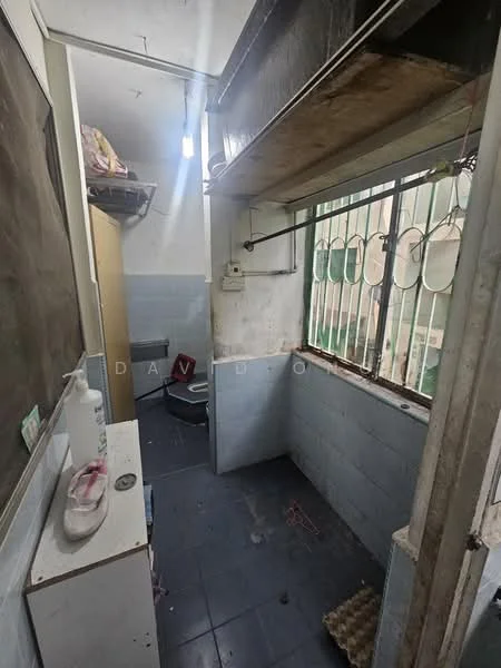 Laundry features: grey tiled flooring, white painted walls, window with metal bars, shelf above washer, washing machine, sink, light fixture, clothes drying rack.
