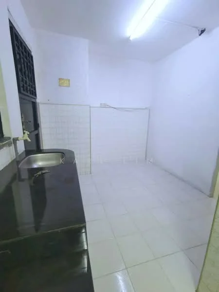 Room features: white painted walls, white tiled flooring, single-bowl stainless-steel sink, black countertop, fluorescent ceiling light, wall-mounted window, tile backsplash.