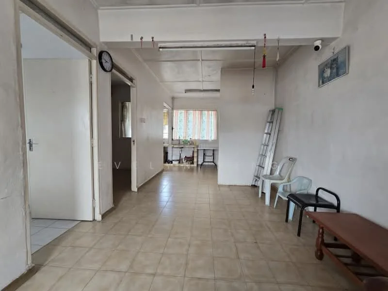 Room features: white painted walls, tile flooring, ceiling with exposed beams, window with sheer curtains, clock on wall, ladder against wall, two chairs, wooden coffee table, dining table in background; style: minimalist.