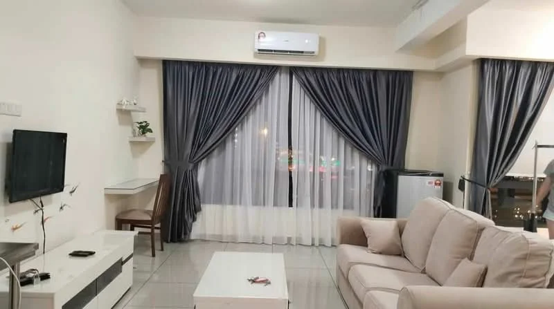 Living features: beige fabric sofa, white coffee table, wall-mounted TV, 1 wall-mounted split AC, floor-to-ceiling windows, sheer curtains, dark grey curtains, light grey tiled flooring, decorative shelf, wooden dining chair, mini fridge; style: modern; view: city.