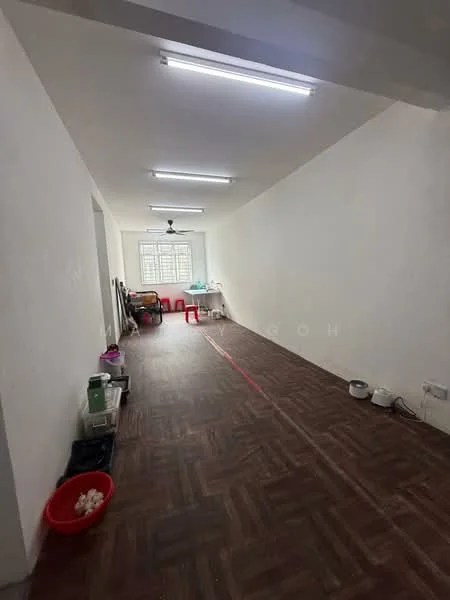 Room features: white painted walls, laminate flooring, ceiling lights, ceiling fan, window with grid, open space layout, multiple power outlets, red plastic chairs, plastic storage containers, pet bowls, red plastic basin; style: minimalist.