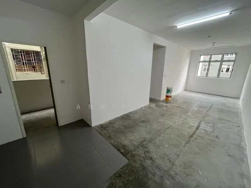 Room features: white painted walls, concrete flooring, fluorescent ceiling lights, window with grid pattern, doorway leading to another room, open layout, no visible furniture, unfinished space; style: minimalist.