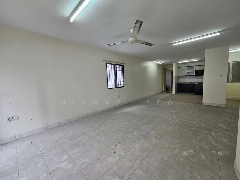Room features: white painted walls, tile flooring, ceiling fan, fluorescent lighting, window with security bars, open layout, kitchen area visible in background, neutral color scheme; style: modern.
