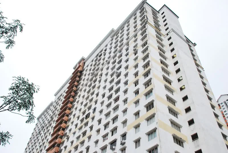 Exterior type: high-rise condominium; features: white painted facade, balconies with orange accents, multiple windows, approximately 20-storey high-rise, flat roof, concrete structure, surrounded by greenery; style: modern.