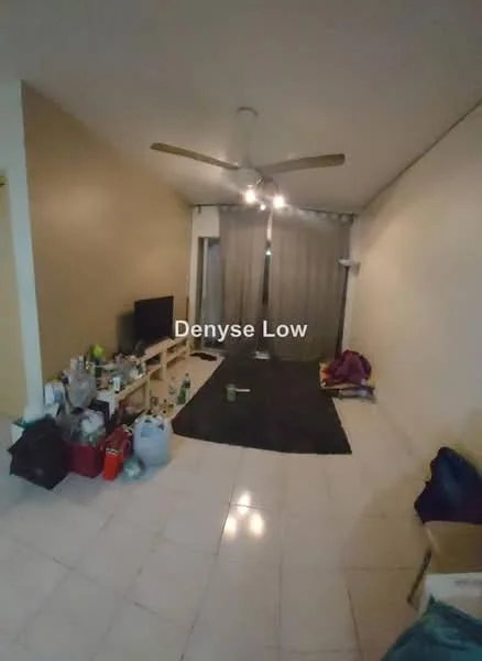 Living features: cream painted walls, light-coloured tiled flooring, 5-blade ceiling fan, wall-mounted TV, TV console, area rug, large window with sheer curtains, various items on the floor including bags and bottles.