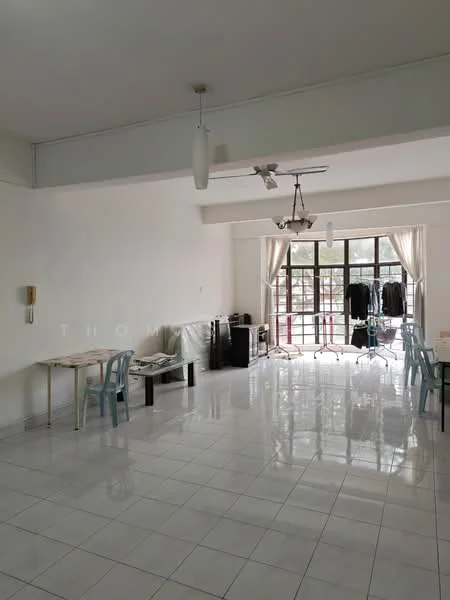 Room features: white painted walls, glossy white tile flooring, exposed beams on ceiling, ceiling fan with light, large windows with sheer curtains, dining table, plastic chairs, laundry rack, black cabinet, open layout; style: modern; view: garden.