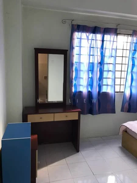 Bedroom features: white painted walls, glossy tile flooring, single bed with pink bedding, wooden dresser with mirror, blue storage cabinet, curtains with blue and white pattern, window with grid pattern, natural light from window.