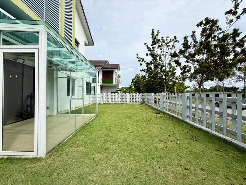 Exterior type: detached bungalow; features: glass wall facade, green lawn, white picket fence, landscaped garden, mature trees, paved walkway, outdoor space, surrounded by greenery; style: modern.