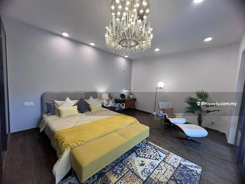 Bedroom features: king-size bed with yellow throw blanket, upholstered headboard, chandelier with multiple bulbs, wooden flooring, decorative area rug with geometric pattern, nightstand with lamp, armchair, side table, wall-mounted artwork, recessed downlights; style: modern.