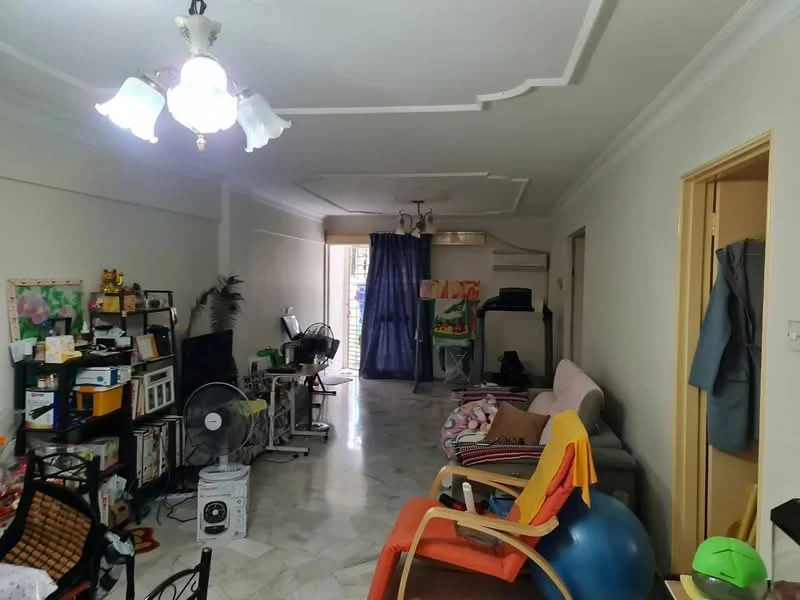 Living features: marble flooring, white painted walls, tray ceiling with chandelier, floor-to-ceiling windows with blue curtains, 2-seater fabric sofa in beige, 3-seater fabric sofa in pink, coffee table, TV console, wall-mounted TV, standing fan, decorative plants, open shelving with books and decor, exercise ball, colorful children's play area; style: contemporary.