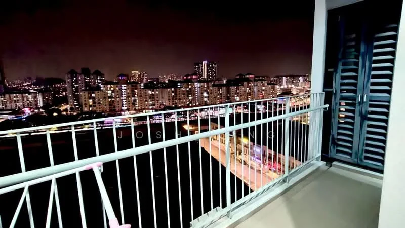Balcony features: metal railing, concrete flooring, sliding glass door, city skyline view, night lighting, outdoor space; view: city.