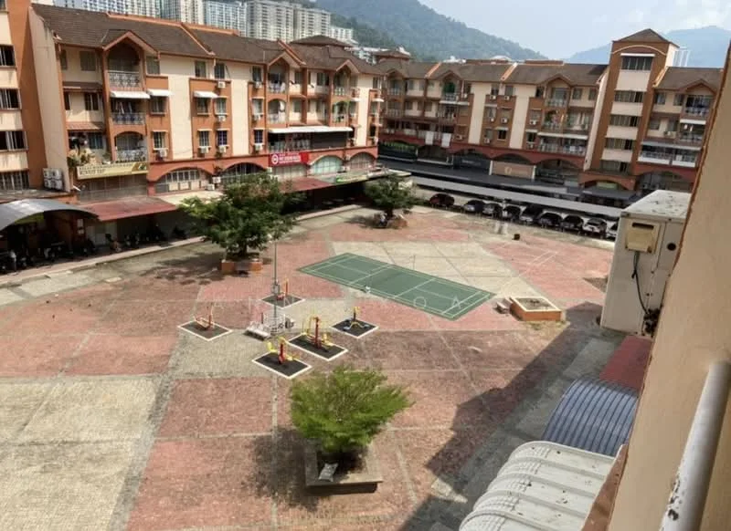 Exterior type: low-rise apartment block; features: brick-paved courtyard, children's playground, basketball court, manicured trees, multiple parking spaces, surrounding residential buildings, mountain view in background; style: modern.