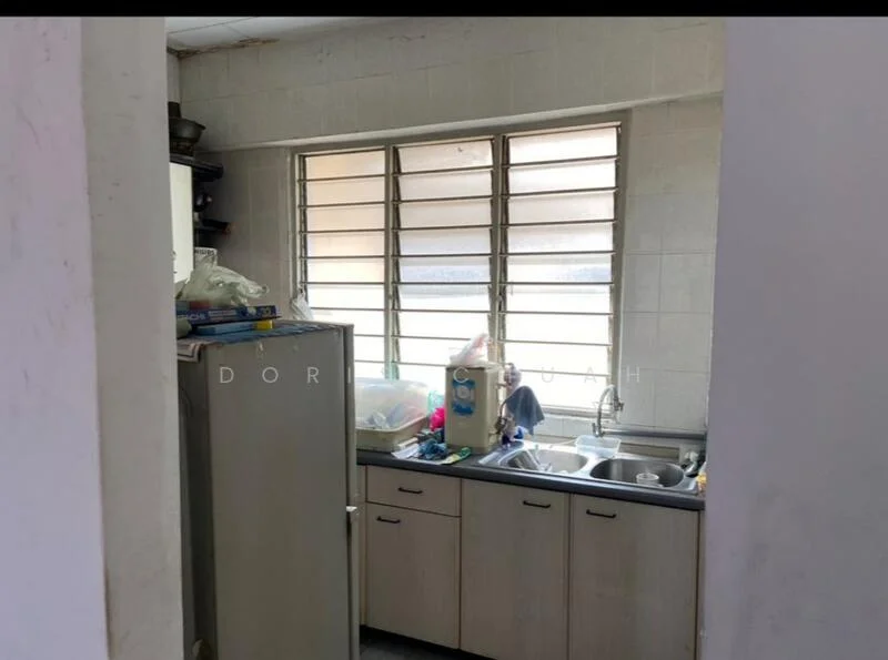 Kitchen features: single-bowl stainless-steel sink, chrome pull-down faucet, grey laminate countertop, light wood cabinetry, white tiled walls, ceramic tile flooring, window with horizontal bars, refrigerator, various kitchen items on countertop.