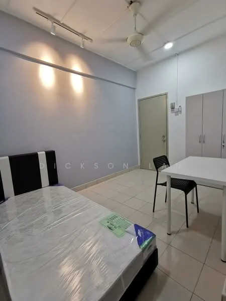 Bedroom features: single bed with mattress, white walls, tile flooring, ceiling fan, 2 wall-mounted lights, study table, black chair, built-in wardrobe.
