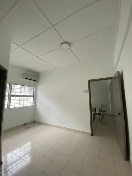 Room features: white painted walls, dropped ceiling, 1 wall-mounted split AC, tile flooring, window with grid pattern, door leading to another room, natural light from window, neutral color scheme; style: modern.