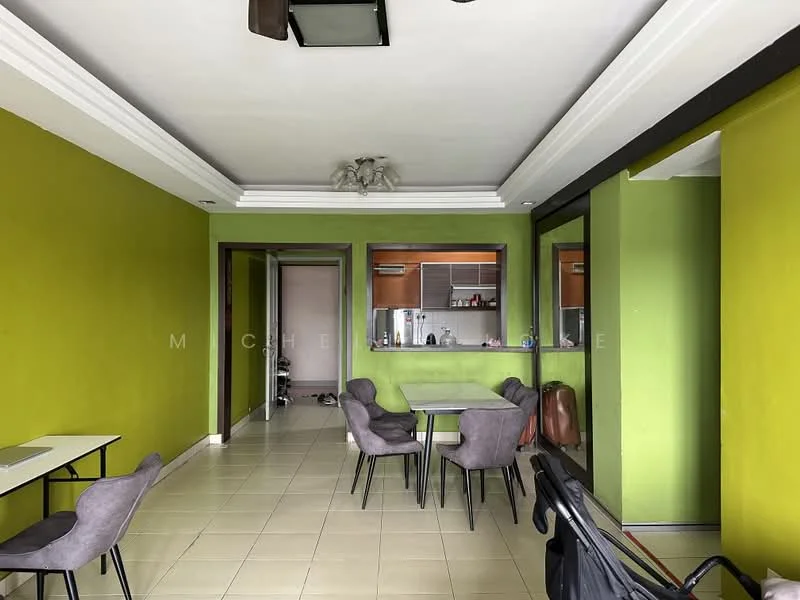 Dining features: green painted walls, white ceiling with crown moulding, tile flooring, 4 dining chairs, 2 small dining tables, open kitchen view, recessed lighting, ceiling fan; style: modern. Kitchen features: kitchen counter with bar opening, stainless-steel appliances visible, wood cabinetry, open layout to dining area; style: modern.