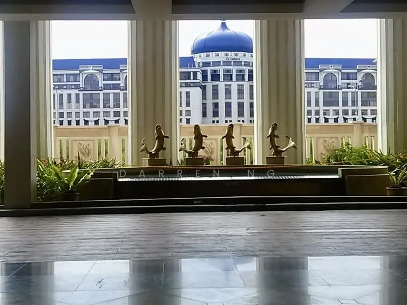 Exterior type: clubhouse; features: water fountain with sculptures, large glass windows, decorative planters with greenery, marble flooring, architectural columns, blue dome roof, modern facade, outdoor seating area; style: modern.
