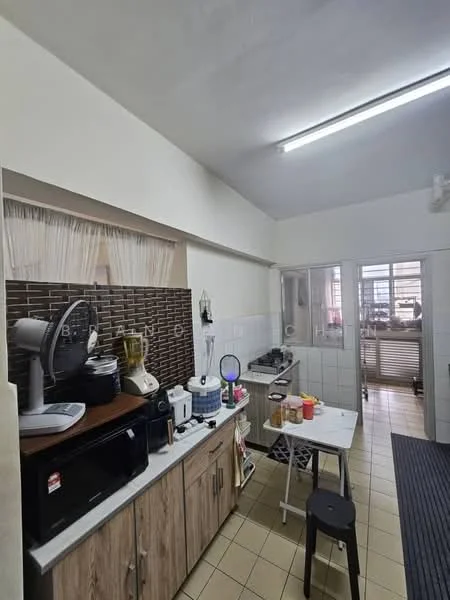 Kitchen features: white painted walls, tile flooring, wood cabinetry, black countertop, stainless-steel sink, chrome pull-down faucet, built-in oven, microwave, blender, kettle, toaster, dining table, stool seating, exhaust fan, window with sheer curtains; style: modern.