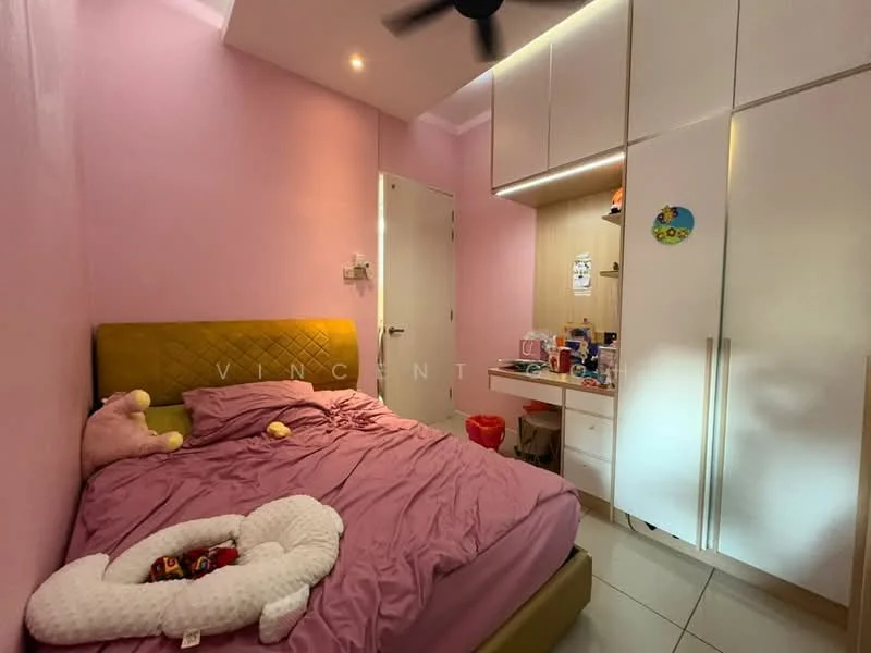 Bedroom features: pink painted walls, white ceiling, 5-blade ceiling fan, queen-size bed with upholstered headboard in yellow, purple bedspread, built-in wardrobe with white doors, study desk with drawers, decorative wall stickers, tile flooring, plush toys on bed, nightstand with items, door to hallway; style: modern.