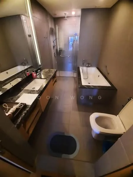 Bathroom features: double-sink vanity with granite countertop, mirror above vanity, built-in cabinetry, bathtub, walk-in shower with glass enclosure, chrome basin mixer faucet, one-piece toilet, tile flooring, recessed lighting, neutral wall colour, shower head, towel rail; style: modern.